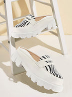 Shop Women White Stiched Zebra Striped Print Back Open Party Slip On Casual Shoes Online.