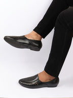 shop men black laser cut design ethnic slip on party juttis and mojaris online.