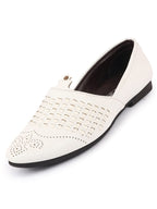 Shop Men White Laser Cut Knitted Design Ethnic Wedding Broad Feet Slip On Juttis and Mojaris Online.