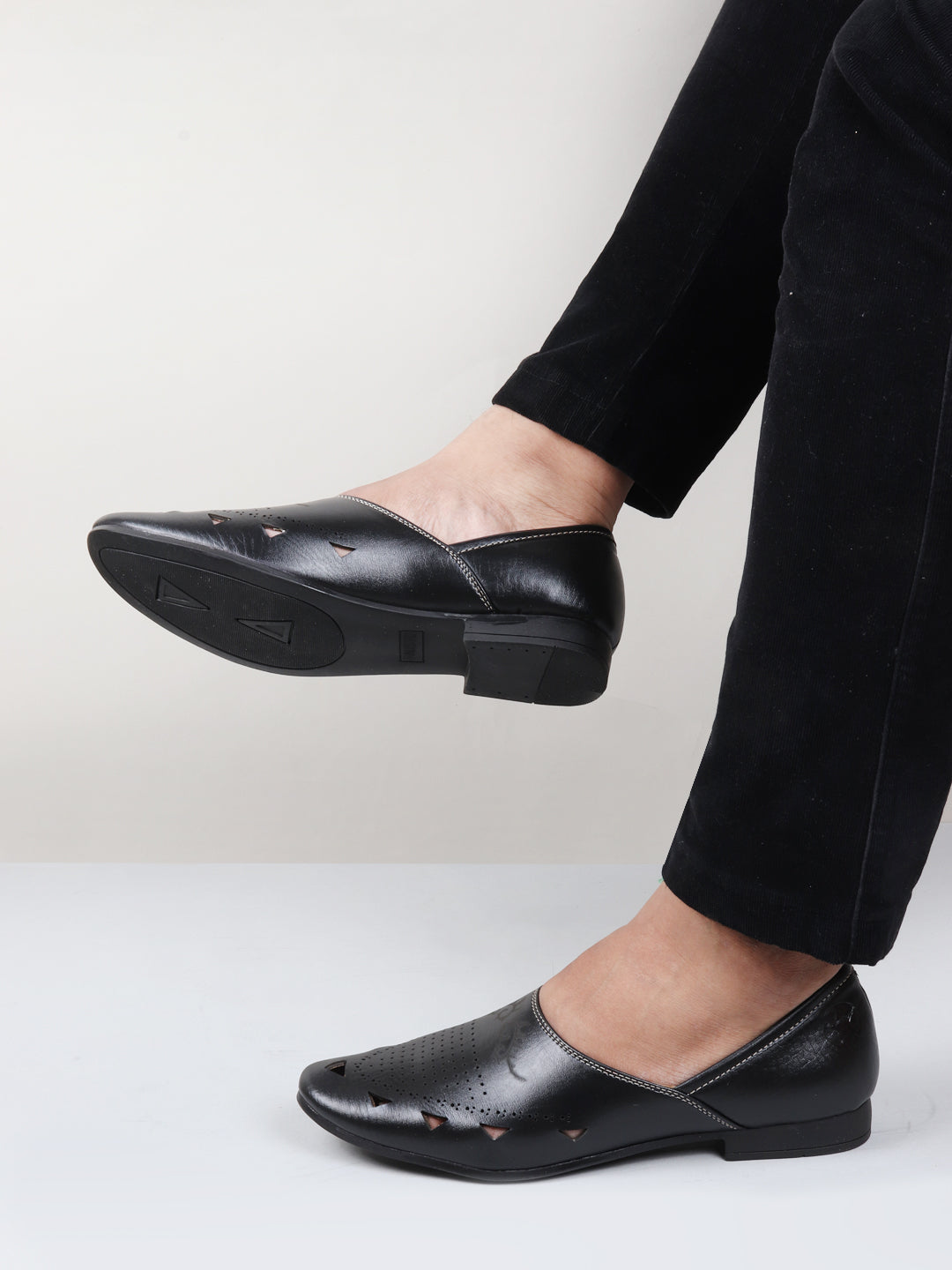 Shop Men Black Ethnic Wedding Party Laser Cut Perforated Design Slip On Juttis and Mojaris Online.