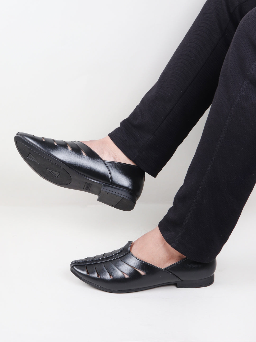 Shop Men Black Ethnic Wedding Party Laser Cut Design Slip On Juttis and Mojaris Online.
