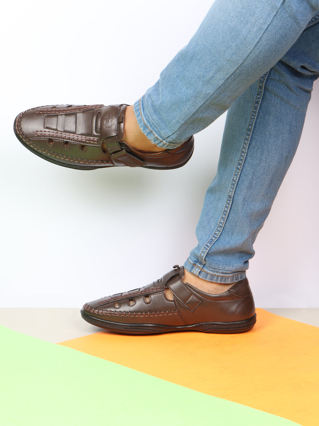 Shop Men Brown Open Sided Stitched Laser Cut Design Roman Sandals with Ankle Strap Online.