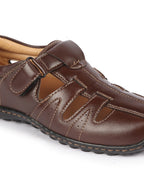 Shop Men Brown Genuine Leather Laser Cut Design Comfort PU Pad Insole Hook and Loop Roman Sandals Online.