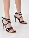 Women Black Stiletto Gladiator Pointed Heels Sandals | Bold Party Wear Sandals with Glossy Finish | 4.25 Inch High Heel for Party, Wedding, Work, Corporate Meetings