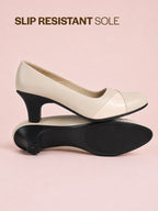cream closed toe block heel pumps