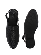 men slip on peshawari chappal
