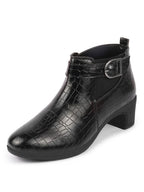 Shop Women Black Flared Heel Mid Top Leopard Print Embossed Design Buckle Strap Chelsea Boots Online.