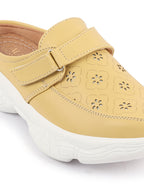 Shop Women Yellow Laser Cut Floral Design Hook and Loop Back Open Slip On Mules Shoes Online.