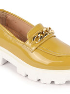 Shop Women Mustard Patent Leather Shiny Chain Buckle Classic Casual Slip On Loafer Shoes Online.