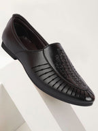shop men black laser cut design ethnic slip on party juttis and mojaris online.
