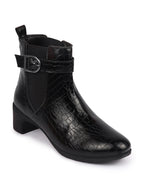 Shop Women Black Flared Heel High Ankle Leopard Print Embossed Design Winter Buckle Strap Chelsea Boots Online.