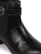 Shop Women Black Flared Heel High Ankle Leopard Print Embossed Design Winter Buckle Strap Chelsea Boots Online.