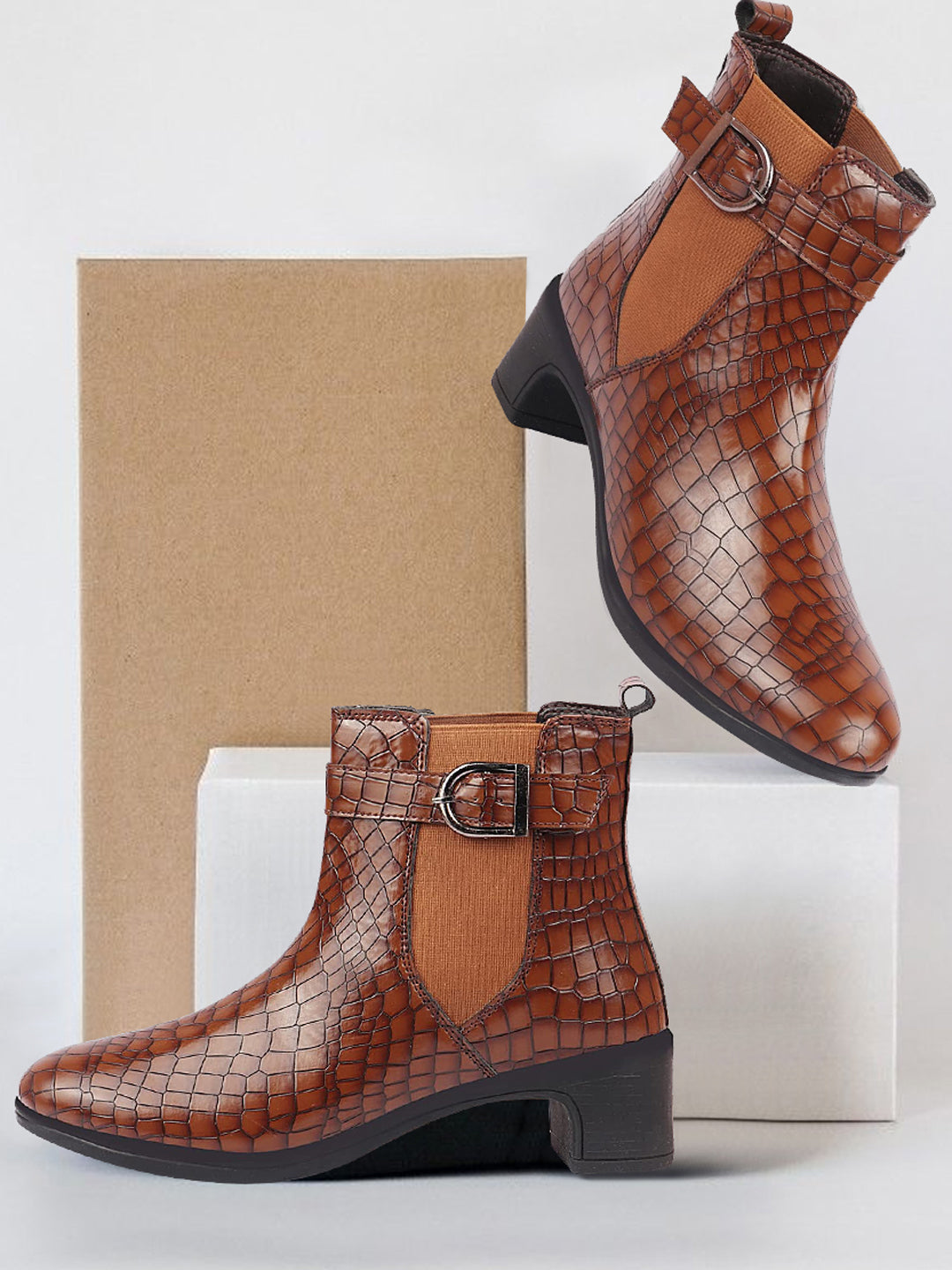 Shop Women Tan Flared Heel High Ankle Leopard Print Embossed Design Winter Buckle Strap Chelsea Boots Online.