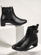 Shop Women Black Flared Heel High Ankle Classic Winter Buckle Strap Chelsea Boots Online.
