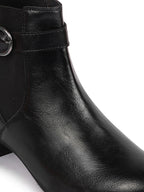 Shop Women Black Flared Heel High Ankle Classic Winter Buckle Strap Chelsea Boots Online.