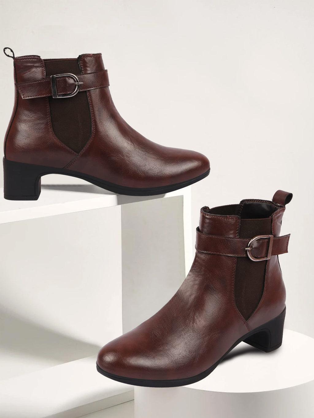 Shop Women Brown Flared Heel High Ankle Classic Winter Buckle Strap Chelsea Boots Online.
