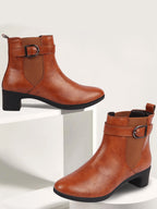 Shop Women Tan Flared Heel High Ankle Classic Winter Buckle Strap Chelsea Boots Online.