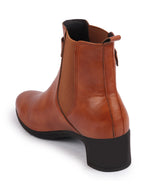 Shop Women Tan Flared Heel High Ankle Classic Winter Buckle Strap Chelsea Boots Online.