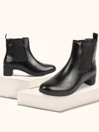 Shop Women Black Flared Heel High Ankle Top Winter Chelsea Boots Online.