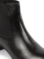 Shop Women Black Flared Heel High Ankle Top Winter Chelsea Boots Online.