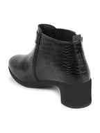 Shop Women Black Flared Heel Mid Top Leopard Print Embossed Design Buckle Strap Chelsea Boots Online.