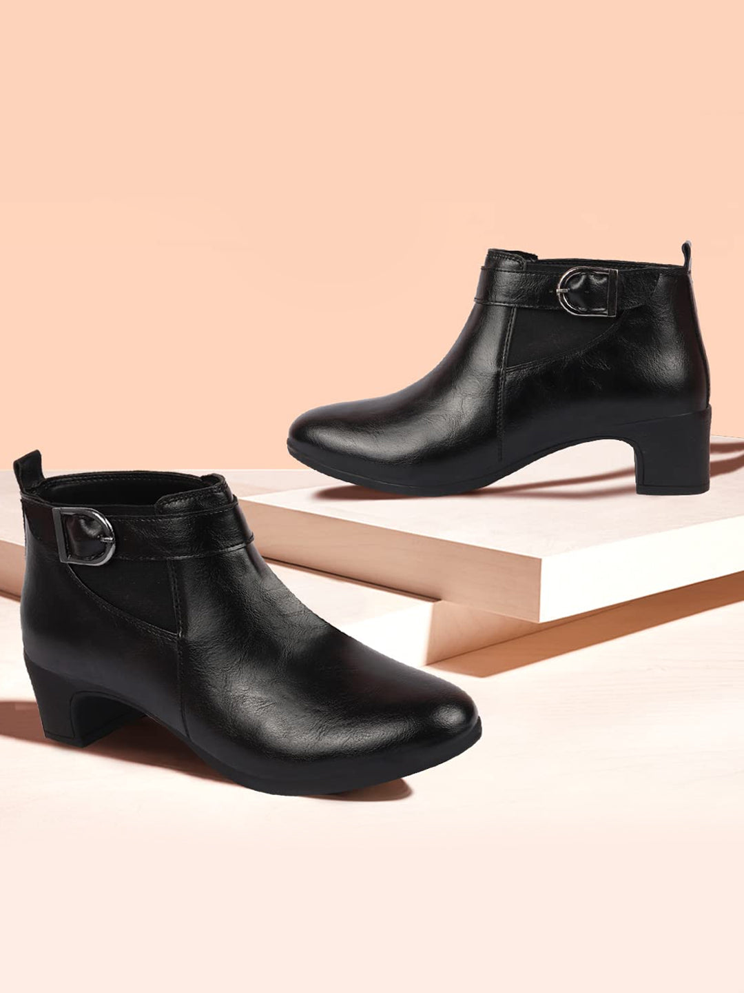 Shop Women Black Flared Heel Mid Ankle Classic Winter Buckle Strap Chelsea Boots Online.