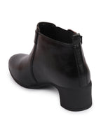 Shop Women Black Flared Heel Mid Ankle Classic Winter Buckle Strap Chelsea Boots Online.